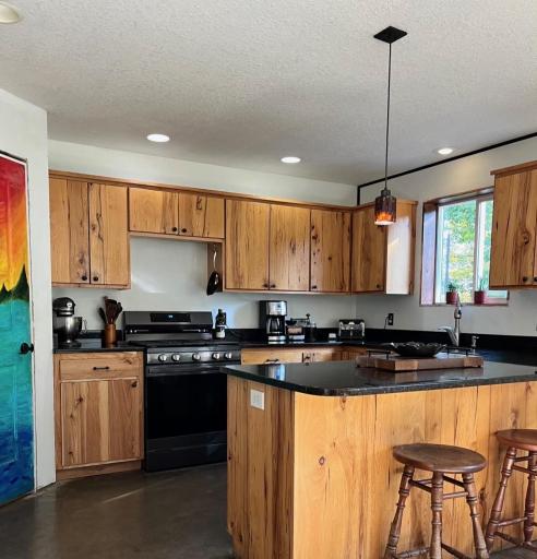refinished kitchen cabinets.jpeg