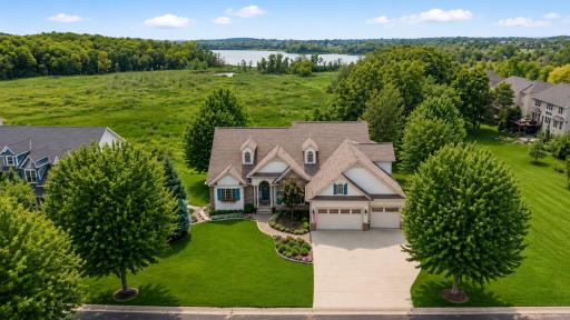 Better than new construction! Stunning luxury custom rambler w/exceptional craftsmanship, designer finishes, open-concept living, w/a pristine setting. Every detail has been thoughtfully upgraded and impeccably maintained. Drive golf cart to Deer Run