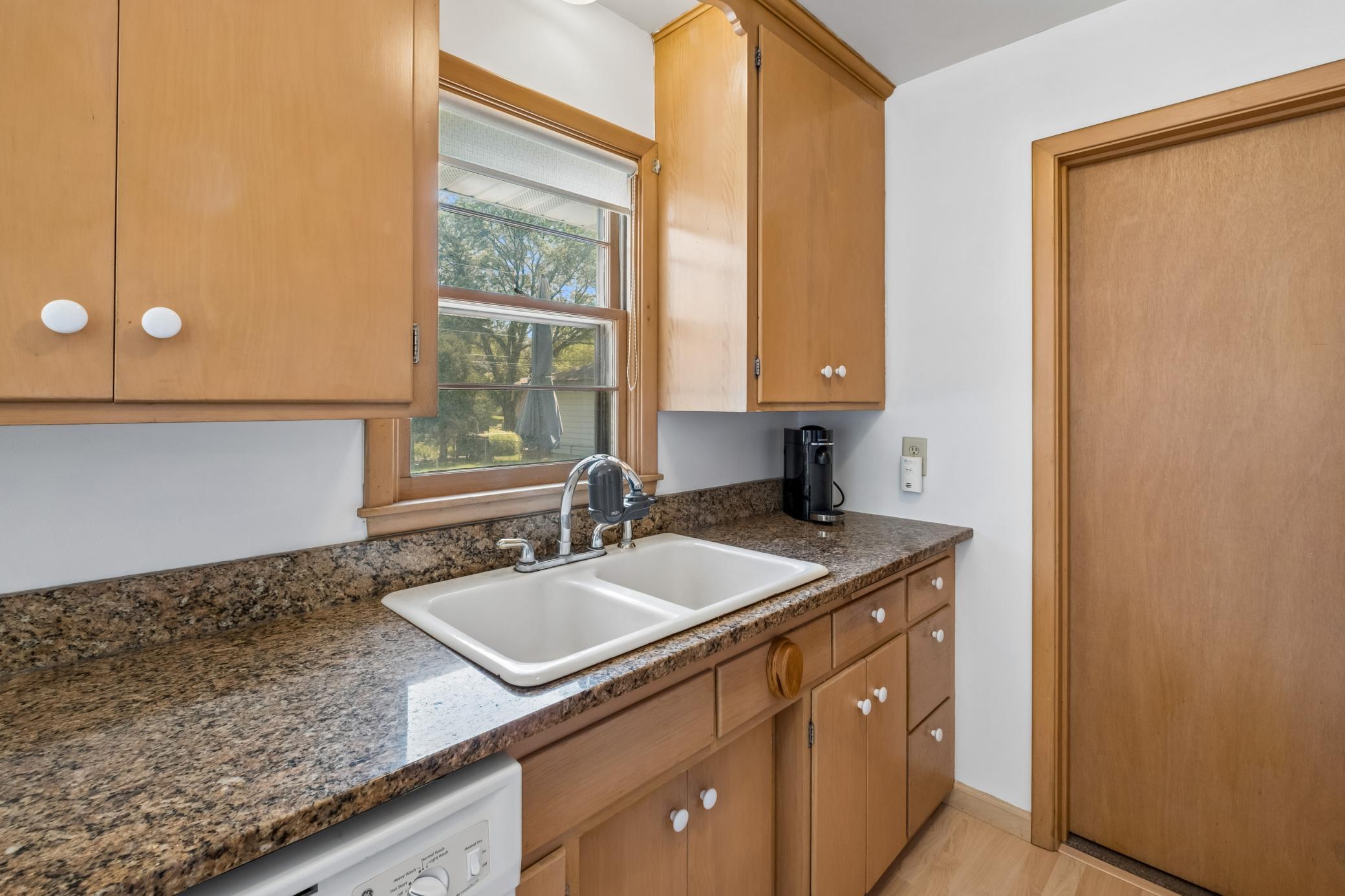 Kitchen window to the backyard.