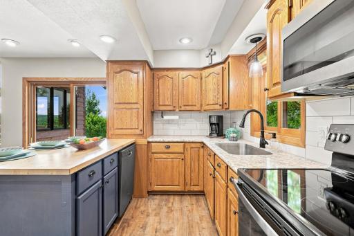 Updated backsplash, counters, appliances and flooring