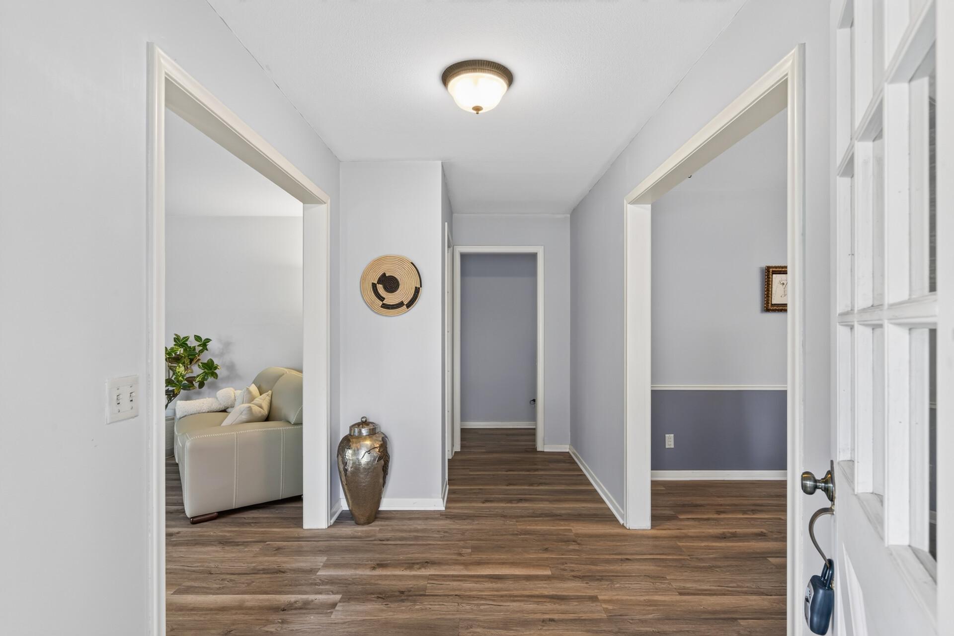 Spacious entryway with large coat closet with pocket doors