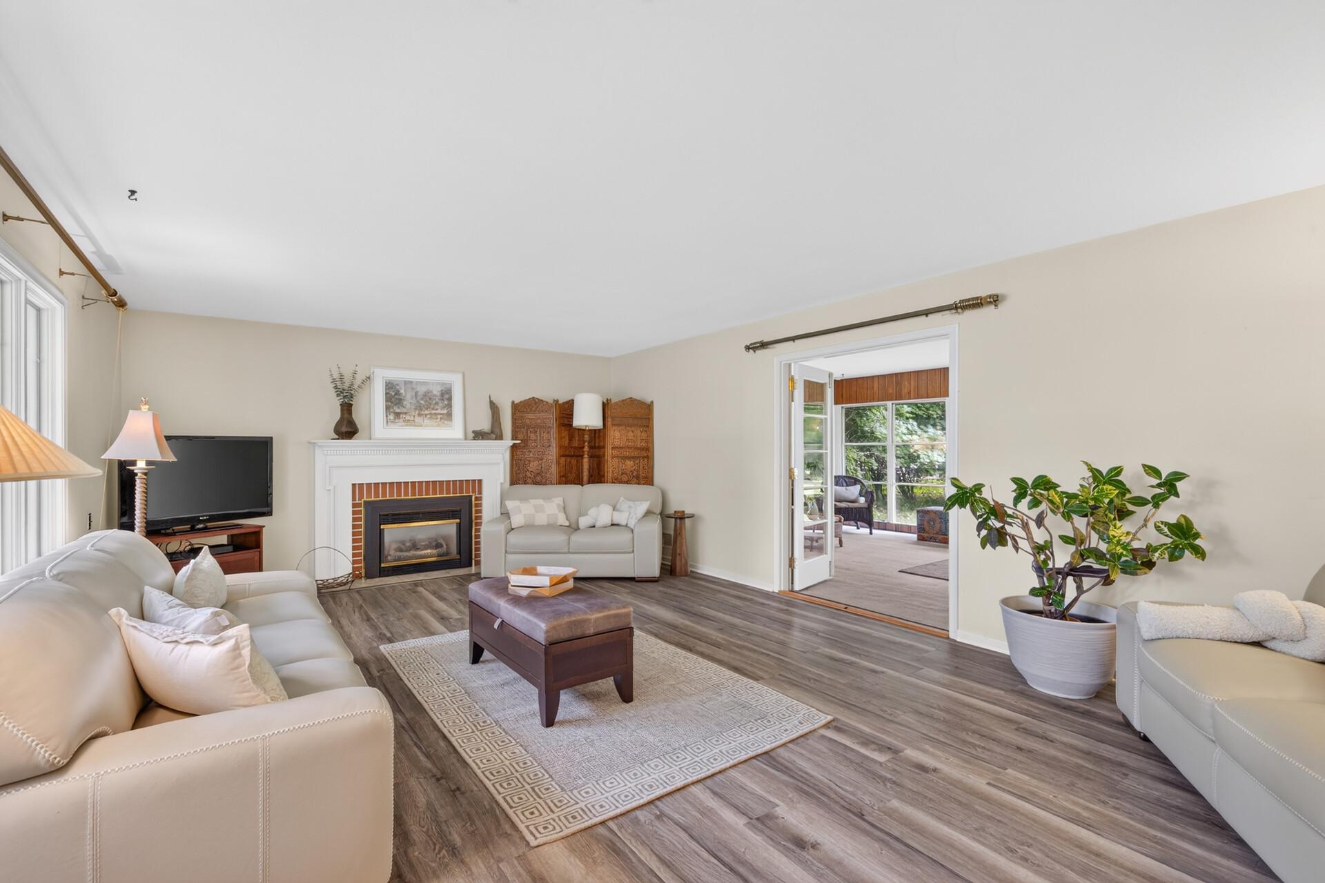 French doors open to 4 season porch