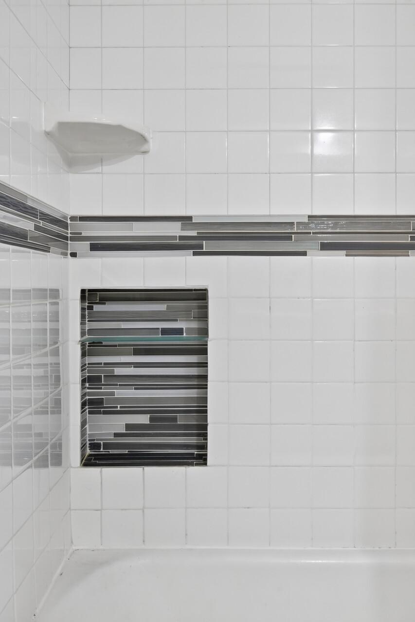 Main floor tub/shower custom tile work