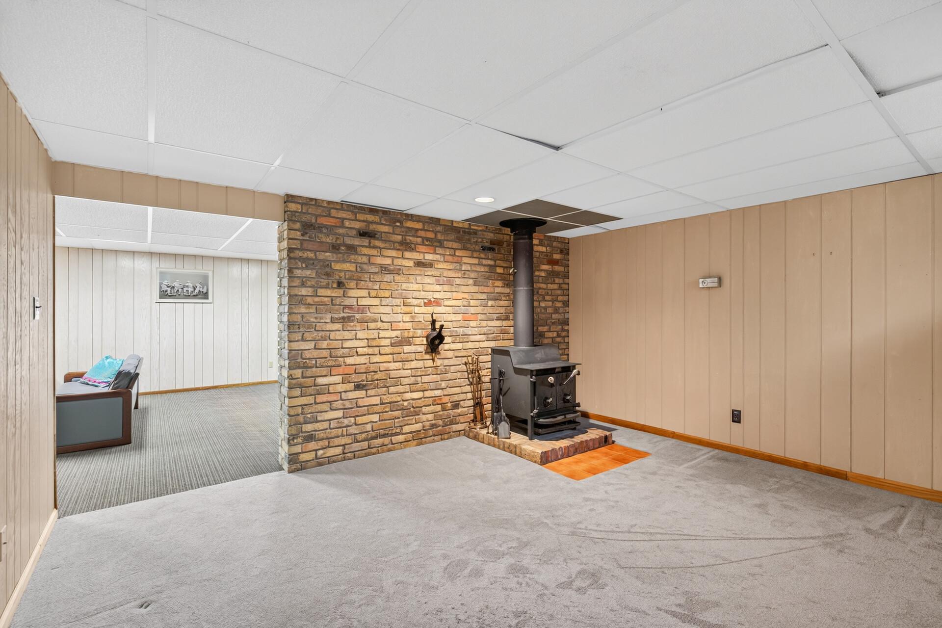 Gorgeous brick wall with woodburning stove (seller has never used so functionality is unknown)