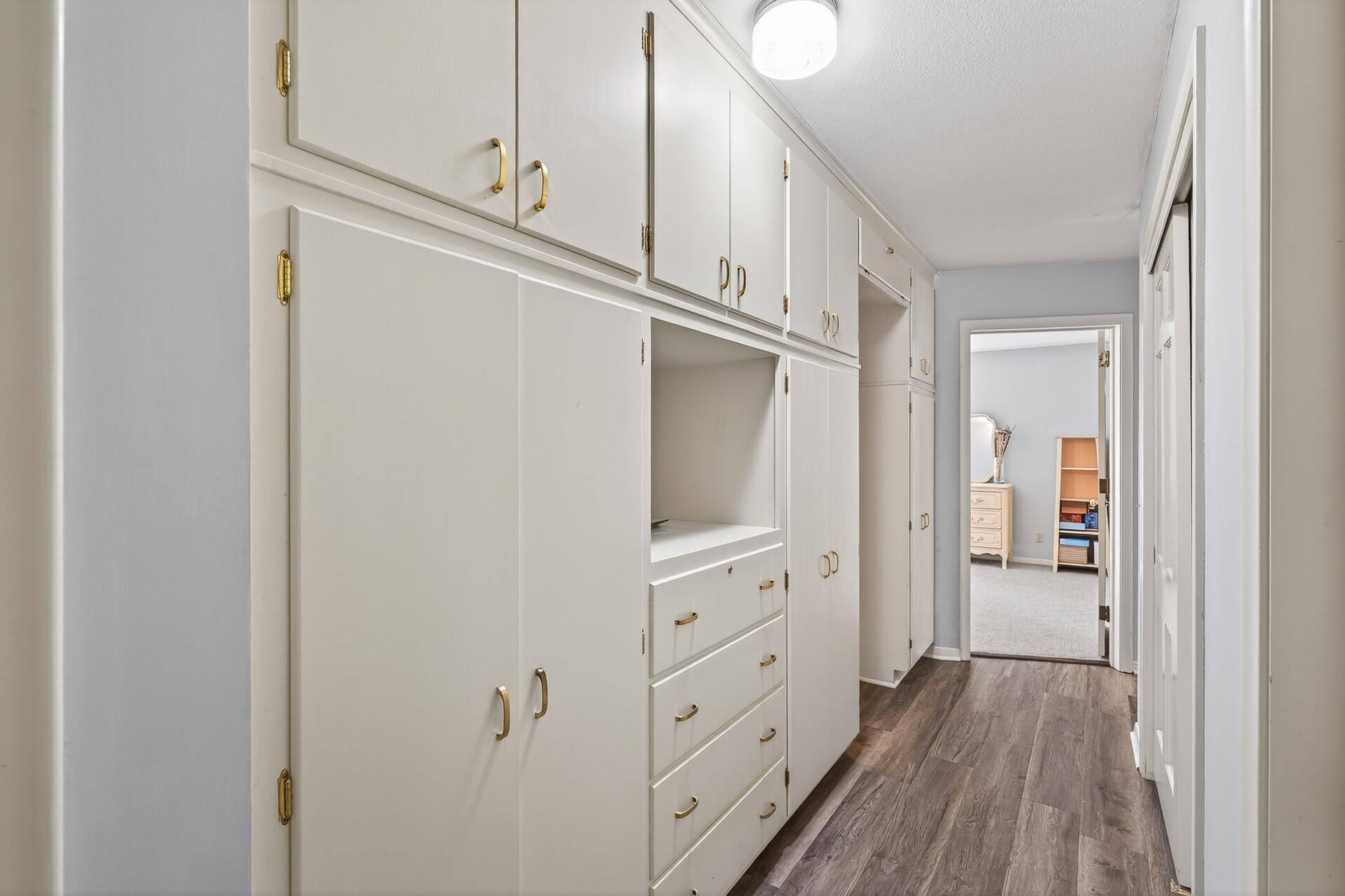 2 walls of storage on the main floor means there is room for everything!!