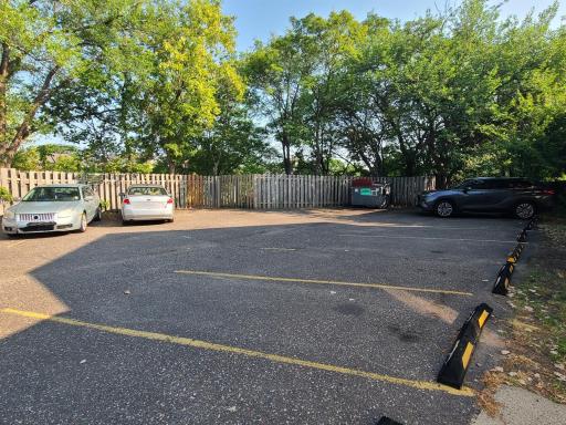 Rear parking lot is designated for this duplex and the other buildings that are adjacent to it.