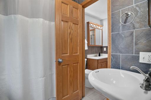 Primary Walk Through Bathroom