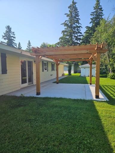 Backyard patio with pergola