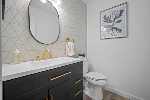 Updated 1/2 bathroom on the main level.