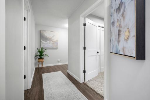 Upstairs welcomes you with white doors, trim, beautiful neutral colors and fresh design, clean spaces!