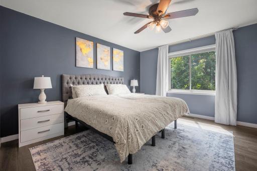 Spacious primary features LVP floors and large windows.