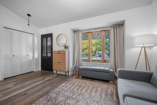 A fresh neutral palette, and white trimwork and doors add timeless style throughout.