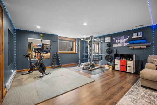 Versatile flex space currently set up as a home exercise nook.