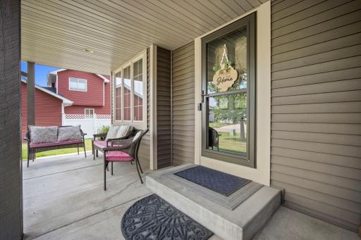 Inviting front porch creates the perfect space to relax and enjoy the outdoors and welcome your guests and visit with neighbors.