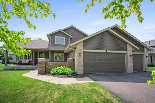 Welcome home to this fabulous Brooklyn Park home near Edinborough. You'll love the front porch and stone patio area.