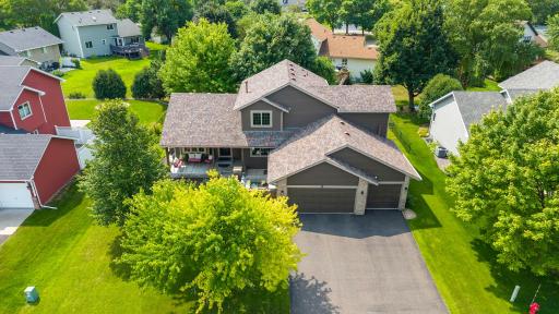 Standout curb appeal with mature trees.