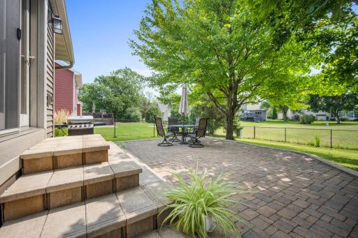Fabulous outdoor spaces. Large backyard paver patio is perfect for relaxing. Fully fenced in backyard!