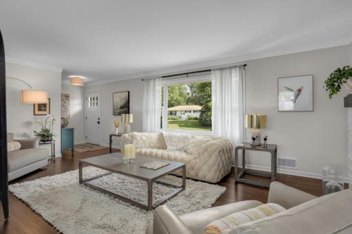 Front Entry and Living Room with Hardwood Floors.
