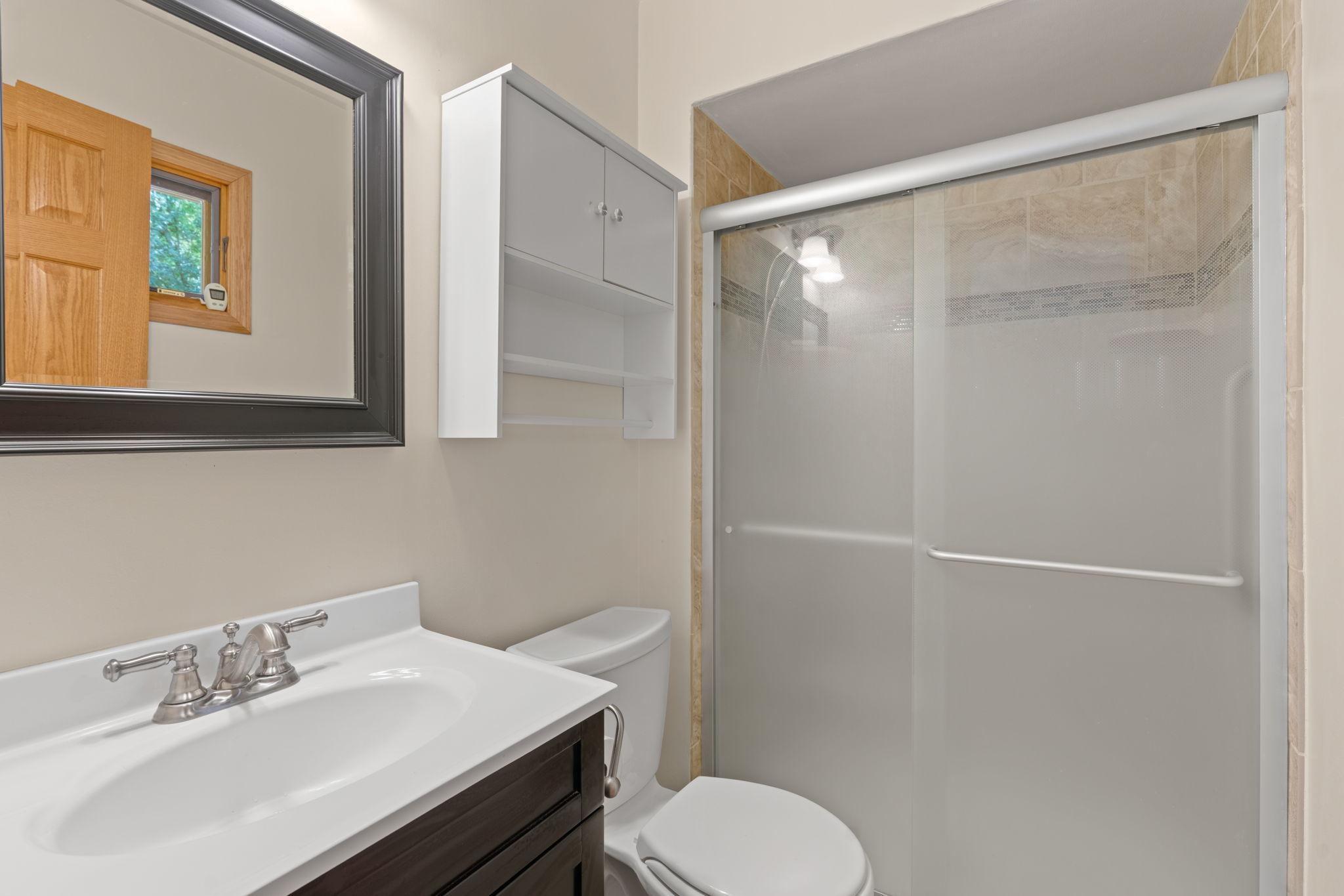 Primary bath with walk in shower.