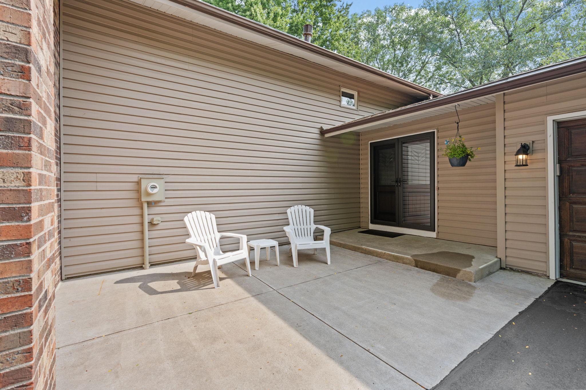 Enjoy relaxing on the front patio while mingling at a neighborhood night out or watching the fun of driveway and cul-de-sac activities.