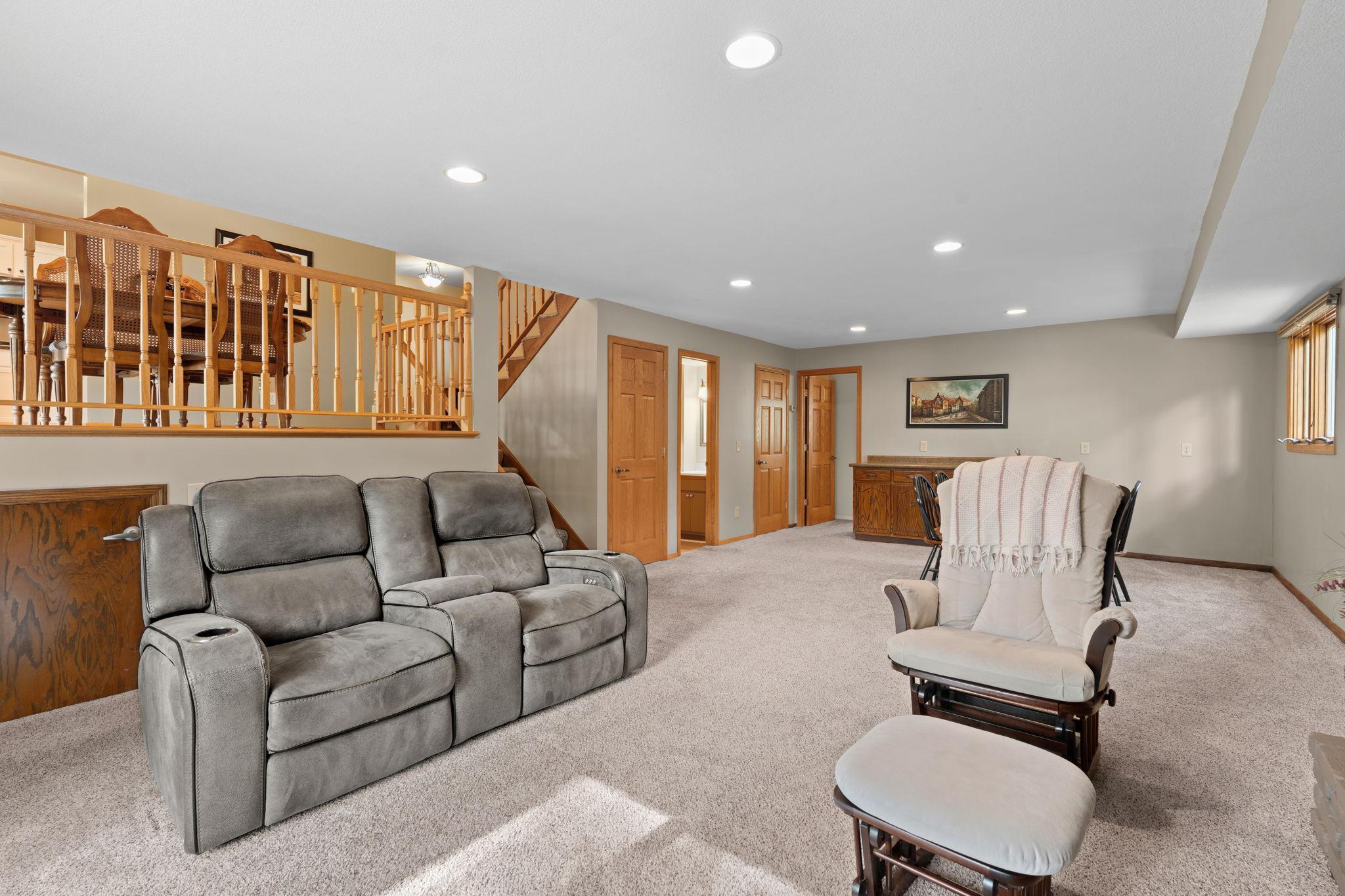The walkout lower level has so much to offer! More living space, a wet bar, fireplace, 4th bedroom, 3/4 bathroom, and storage coming out your ears!
