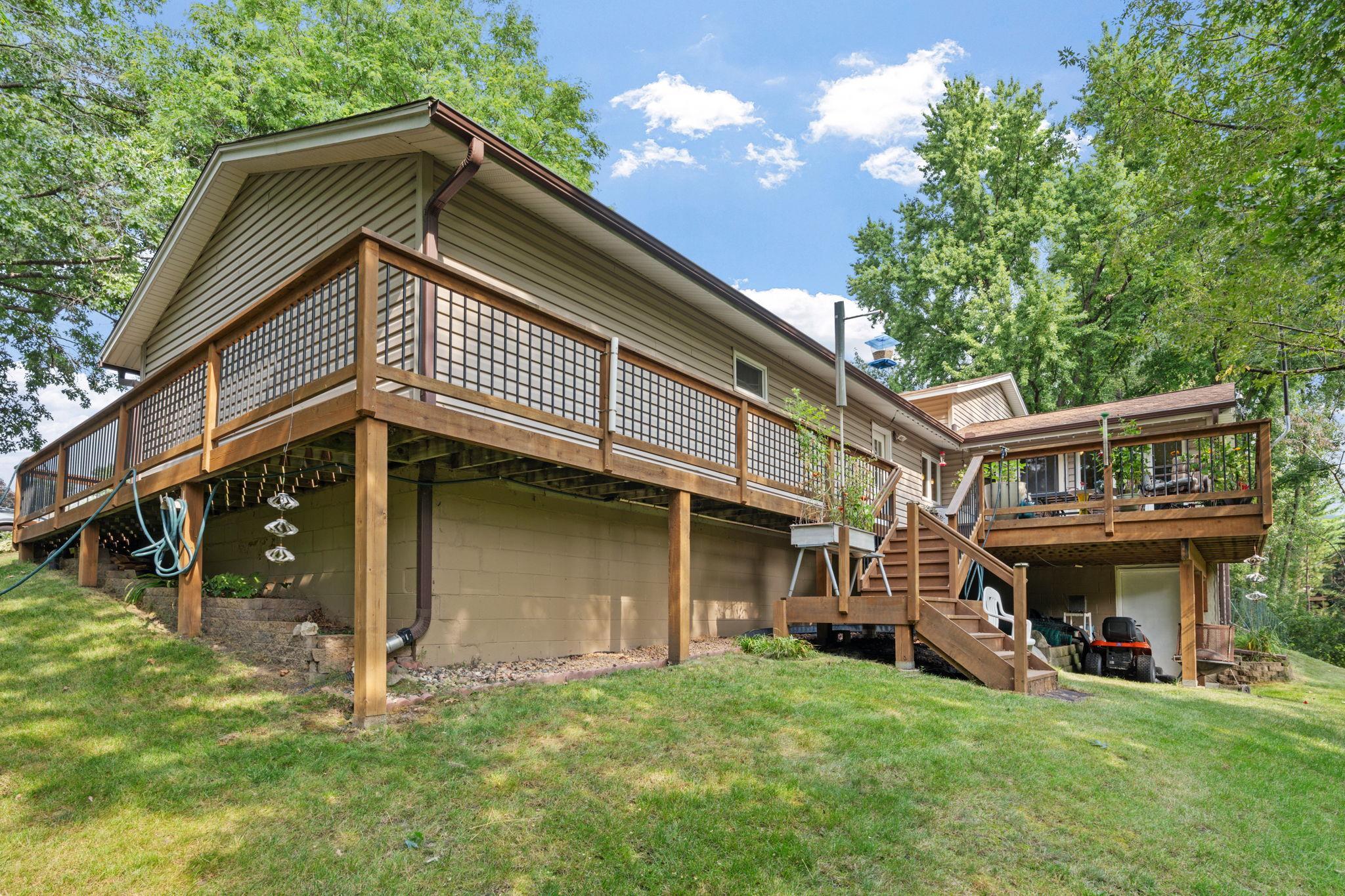 Over the years, the home grew right along with its owners, including a beautiful addition, wrap around deck and a storage room beneath the addition, leaving your three car garage with room for cars and hobbies.