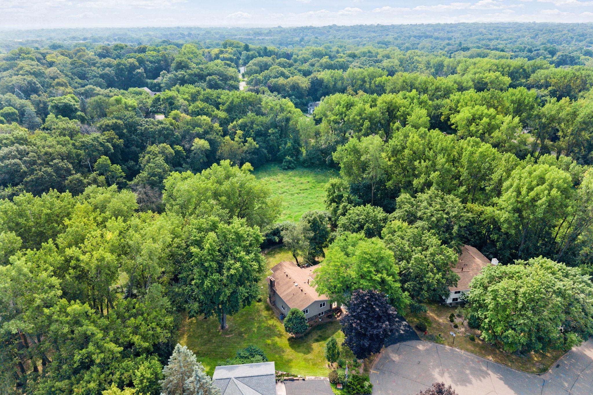 Minnetonka, where that sense of nature and privacy comes with the convenience of being close to everyday shopping, dining, parks, trails and access to several incredible school options!
