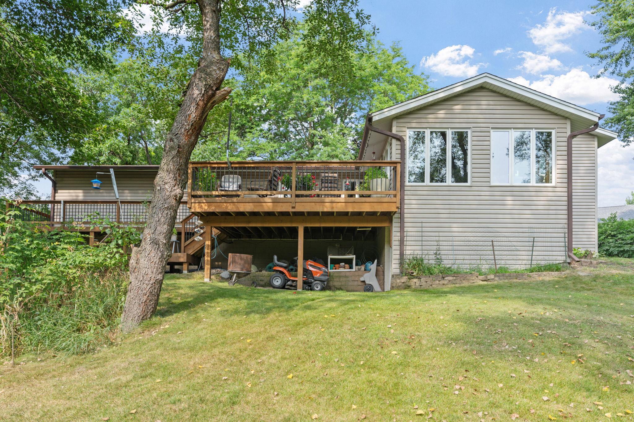 Over the years, the home grew right along with its owners, including a beautiful addition, wrap around deck and a storage room beneath the addition, leaving your three car garage with room for cars and hobbies.