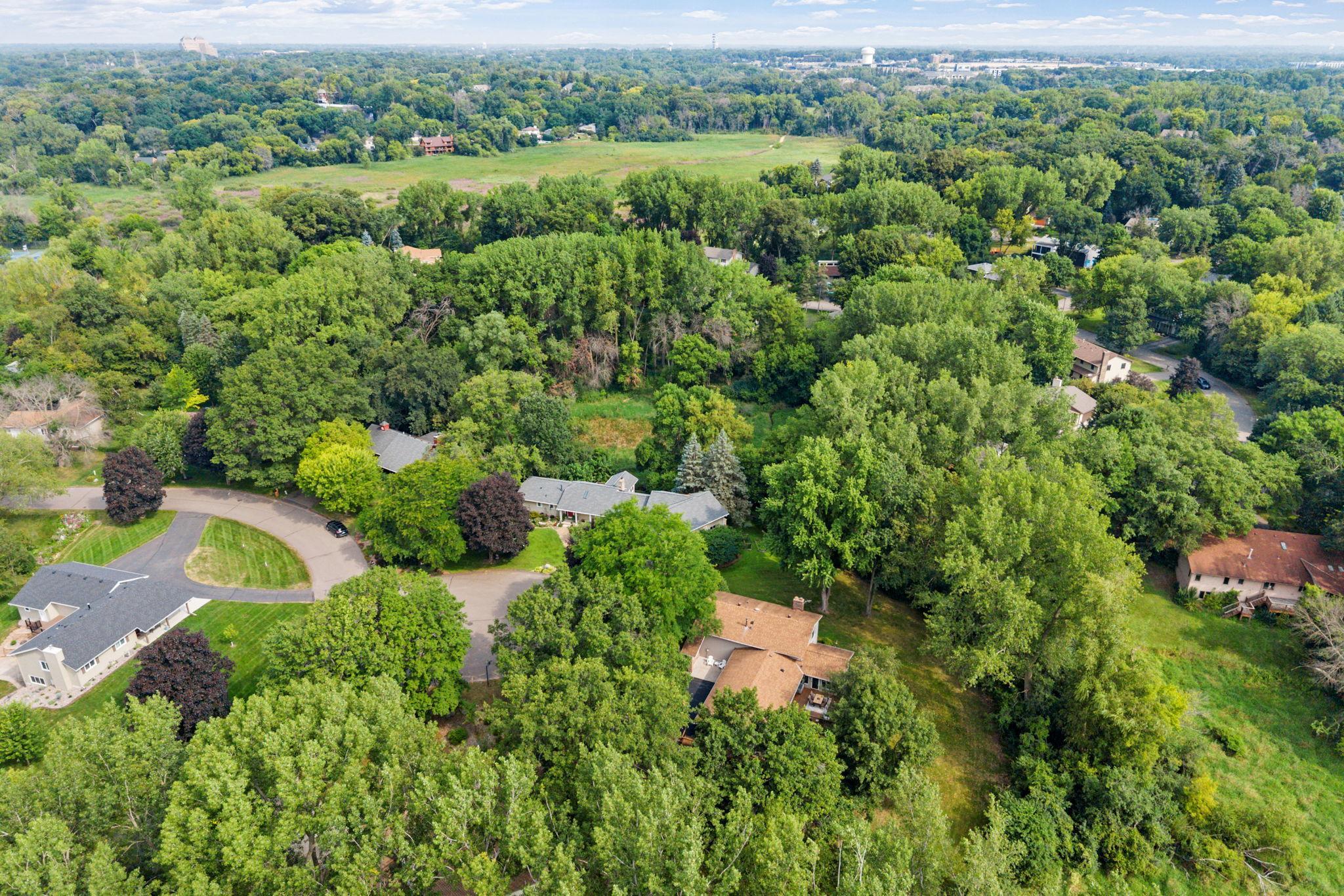 Minnetonka, where that sense of nature and privacy comes with the convenience of being close to everyday shopping, dining, parks, trails and access to several incredible school options!