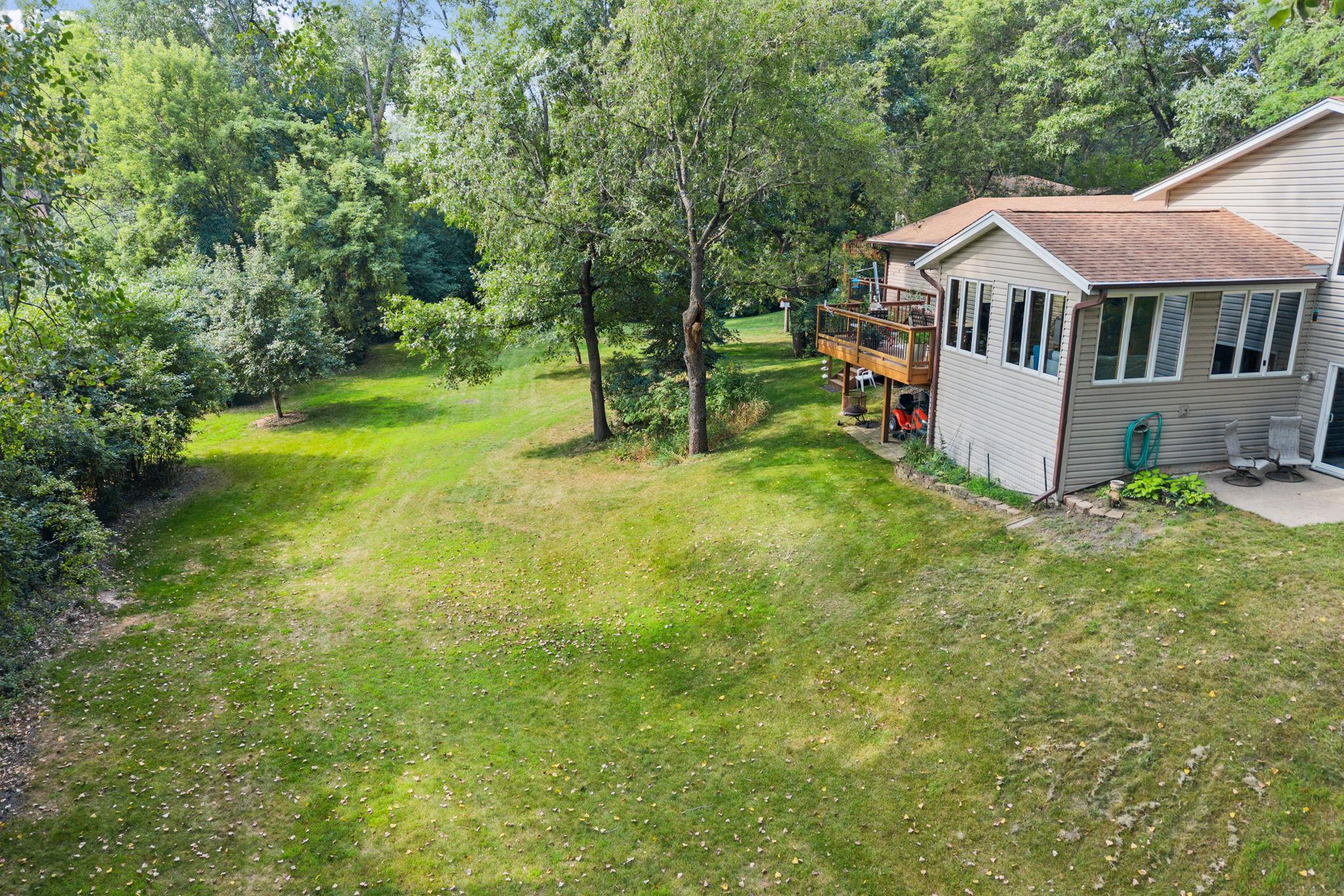 The huge backyard backs to 2+ acres of wetlands and 1.25+ acres of city land, complete with a creek and plenty of wildlife.