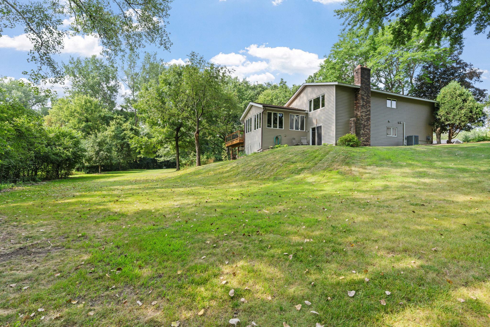 The huge backyard backs to 2+ acres of wetlands and 1.25+ acres of city land, complete with a creek and plenty of wildlife.