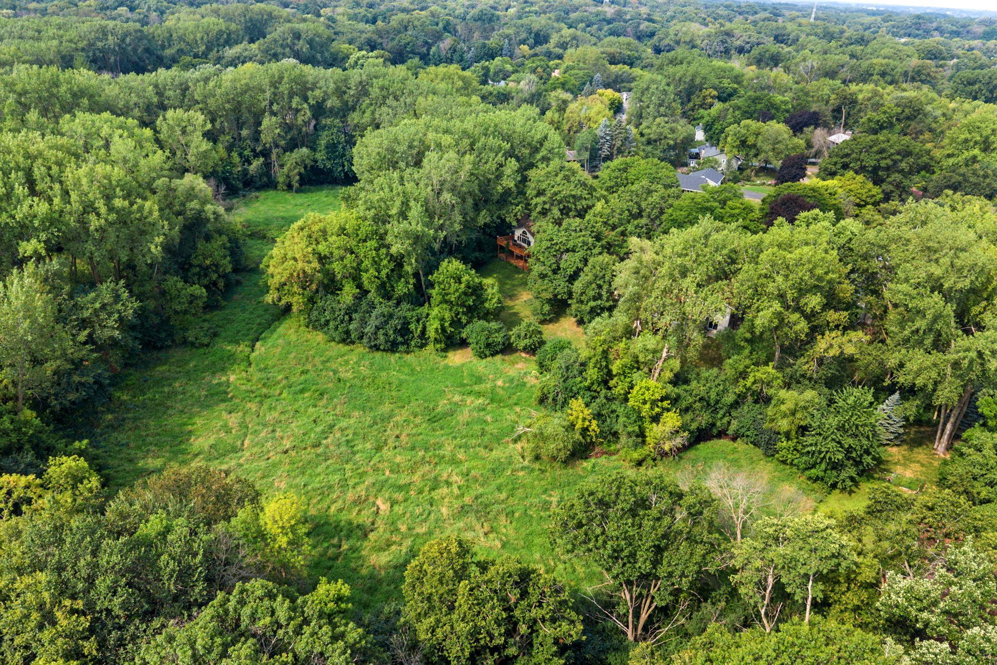Minnetonka, where that sense of nature and privacy comes with the convenience of being close to everyday shopping, dining, parks, trails and access to several incredible school options!