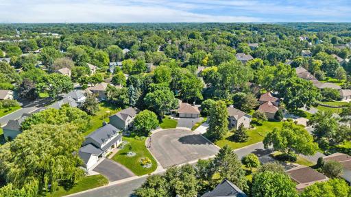 This property offers a wonderful combination of character, spacious living areas, beautiful finishes, and a peaceful backyard setting, all in a location close to local lakes, parks, schools, Elm Creek, and the Shoppes at Arbor Lakes.
