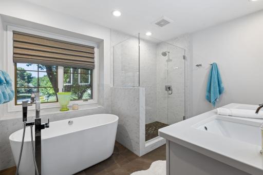 Soaking tub, tiled walk-in shower, and double vanity!