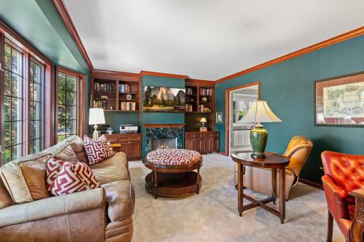 A gas fireplace creates the perfect gathering spot during the colder months, while the surrounding details give the room a comfortable yet refined feel.