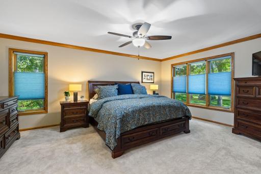 Upstairs, three comfortable bedrooms include a spacious primary suite with thoughtful details.