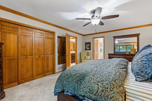 Enjoy detailed trim, ceiling fan, updated windows (2025), and cozy carpeting.