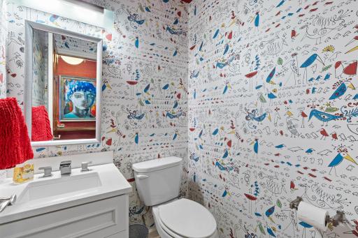 A main level half bathroom adds convenience.