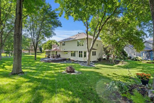 Whether enjoying morning coffee, hosting gatherings, or spending time outdoors, this space offers room to relax and unwind. An in-ground sprinkler system provides added convenience.