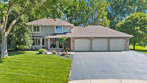 Finished three-car garage with a durable Polyurea floor coating!