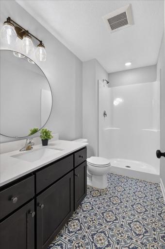 Stained knotty alder vanity and quartz top w/undermount sink!