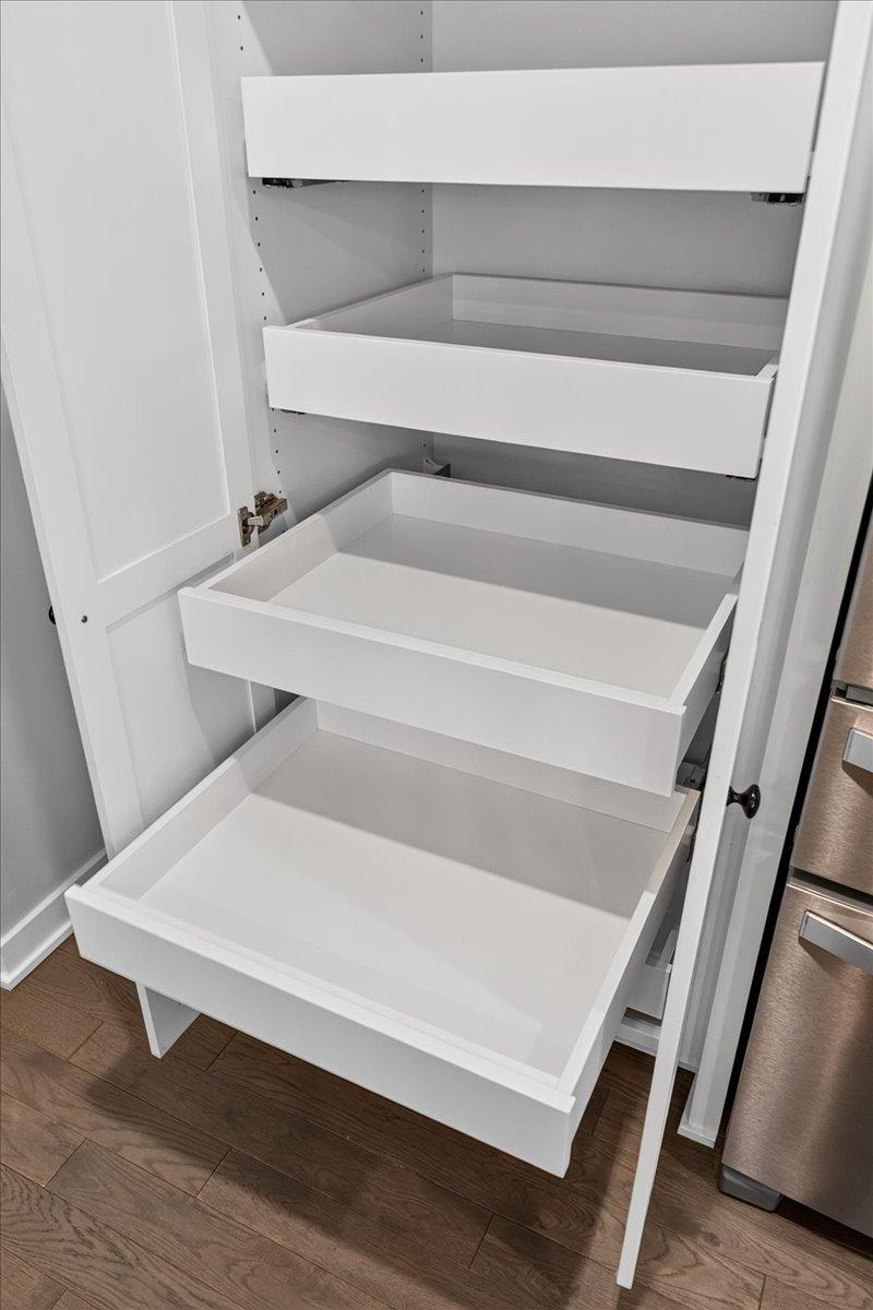 Roll out shelves in pantry make access easy