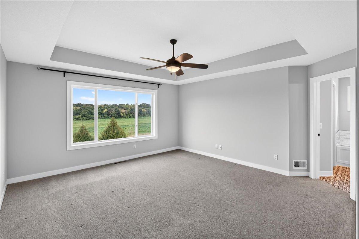 Relaxing Primary bedroom w/box ceiling and