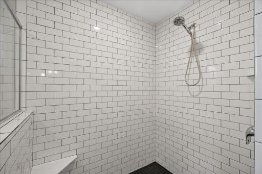 Over-sized shower with tile to the ceiling