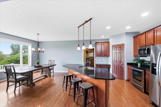 Open kitchen layout connects seamlessly to surrounding living and dining spaces.