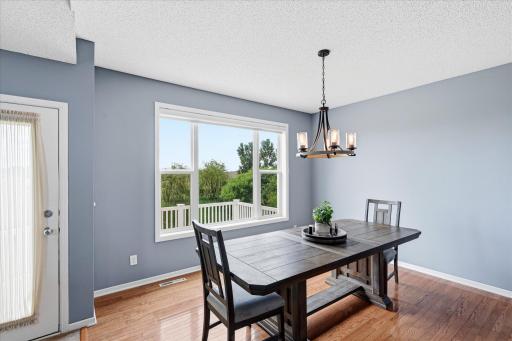 Dining space positioned to take advantage of natural light and backyard views.