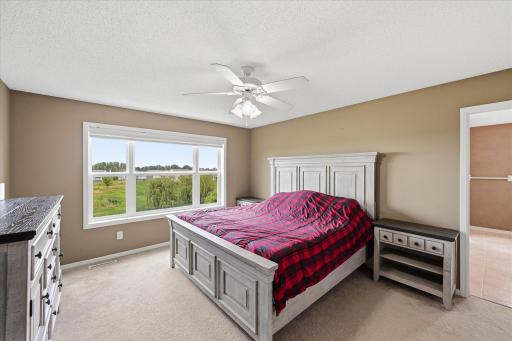 Primary suite designed with comfort and functionality in mind.