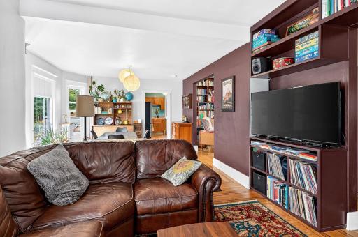 living room with custom built in shelving