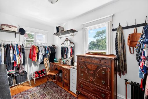 One upper bedroom is used as a walk in closet