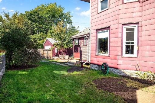 great size yard with full fencing for dogs, kids, BBQing and campfires